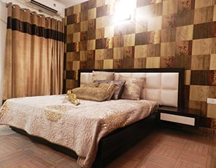 A Bedroom at Saya Desire Residency - 2/3/4 BHK Luxury properties for Sale in Indirapuram Ghaziabad